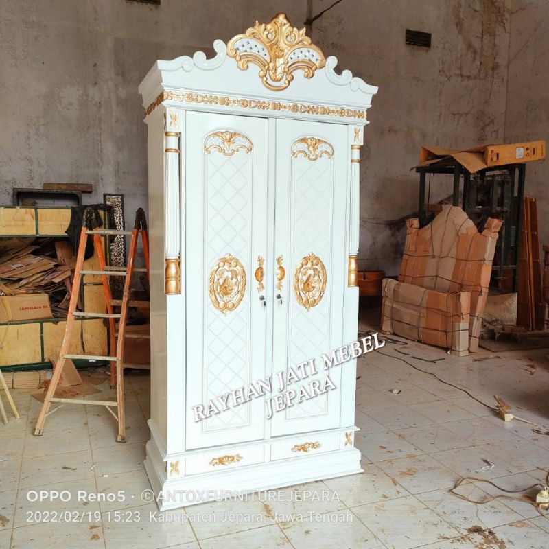 lemari pakaian jati ukiran cinta mebel Jepara