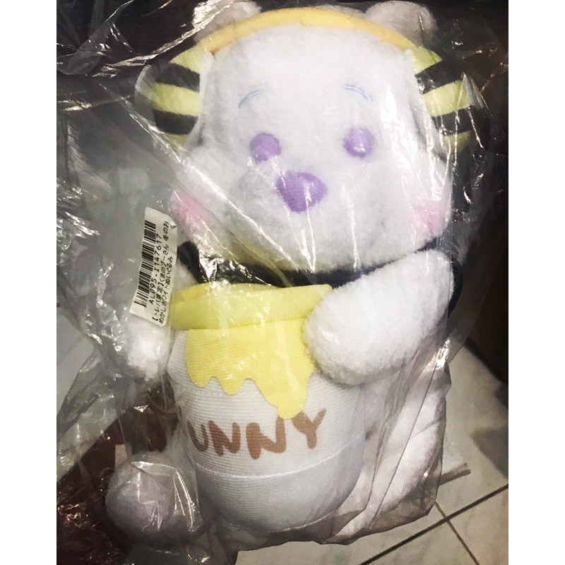 White pooh with purple eyes