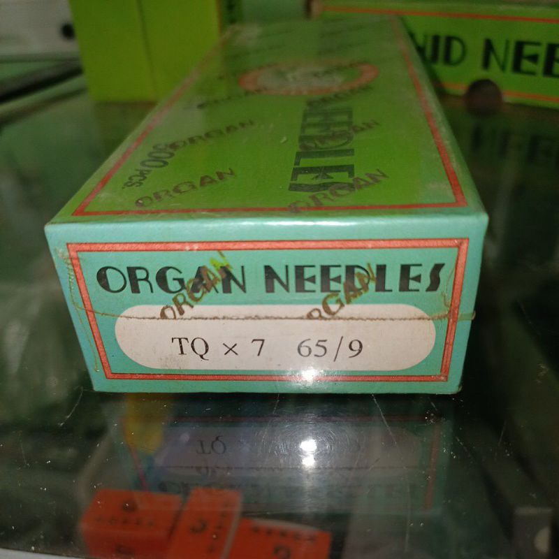 Jarum pasang kancing juki TQ x 7 nomor 9 merk Organ