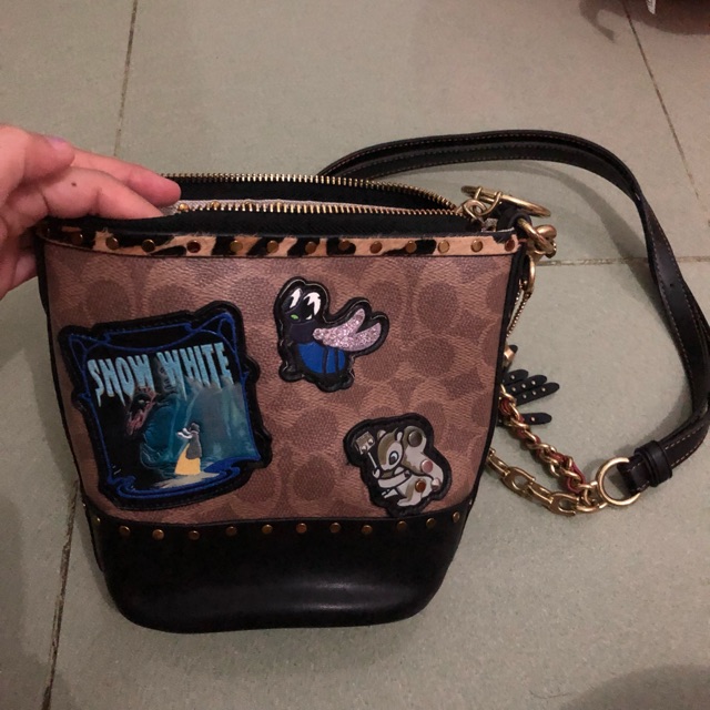 Coach x disney duffle in signature patchwork