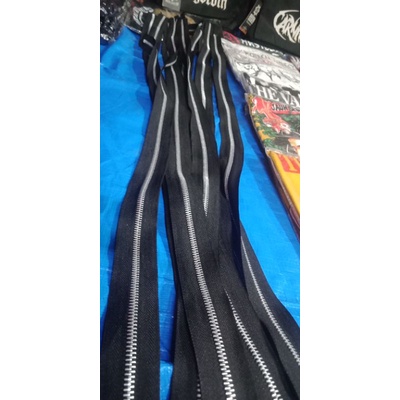 resleting jual permeter,resleting gigi besi.resleting jaket.resleting emblem.resleting gigi besi