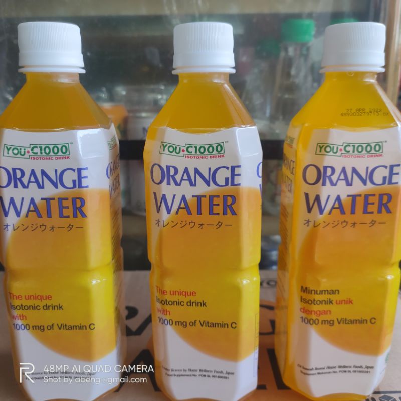 

you c1000 orange water kemasan 500ml PET.