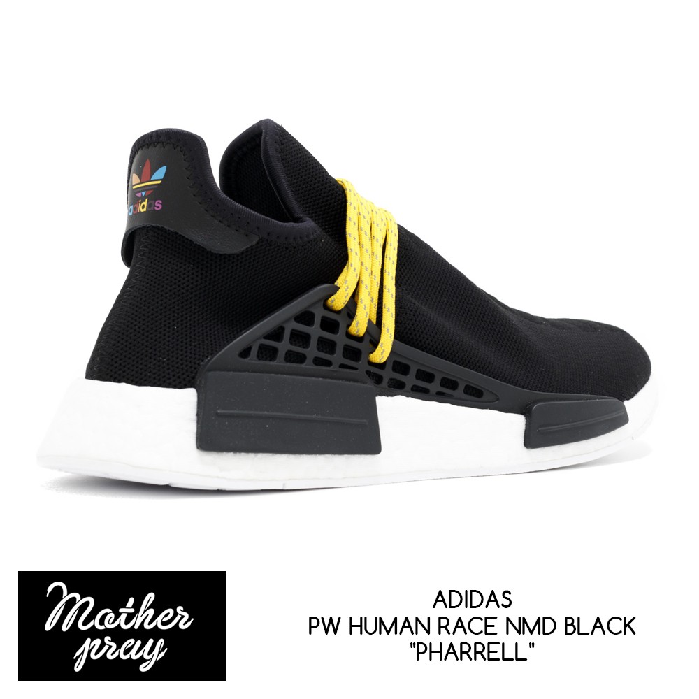 human race nmd black and yellow