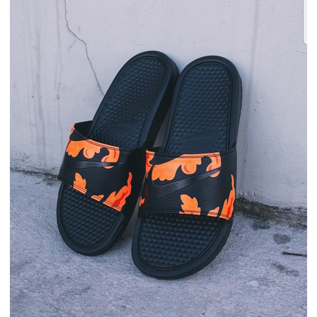 orange nike benassi slides