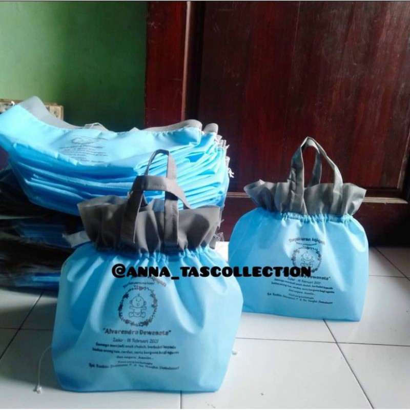 

Tas serut spunbond sablon/ Tas box nasi 22x22x30 min 50pcs (TasJahit Bukan Press)