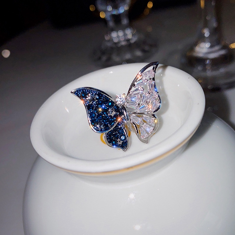 Cincin Model Terbuka Adjustable Desain Kupu-Kupu Biru Aksen Zircon Untuk Wanita