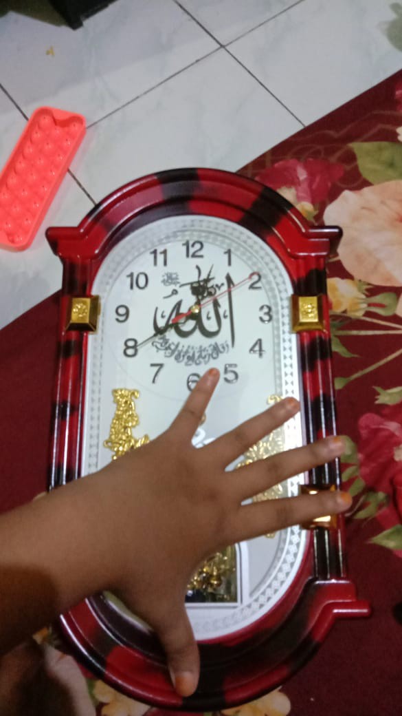 Jam Dinding Unik Bunyi Komedi Putar