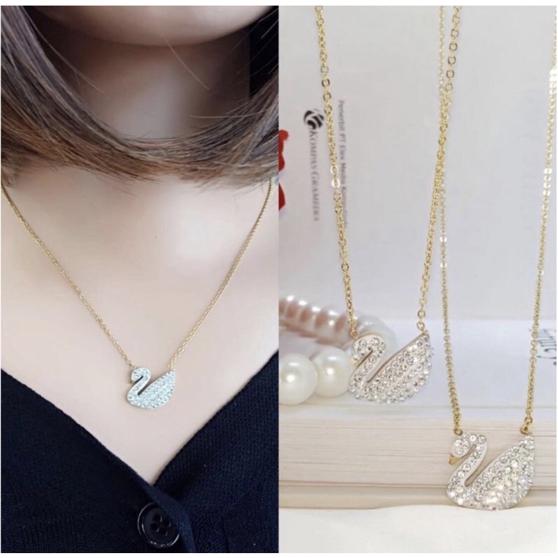 kalung titanium bebek putih