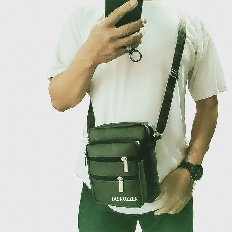 Tas selempang pria kulit asli model banyak saku polos