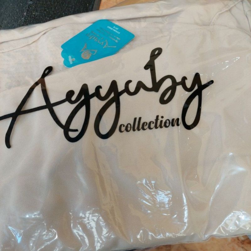 HIJAB PLISKET POLOS RASTY CERUTY PREMIUM ORI AYYUBY-Polos rasty Krem