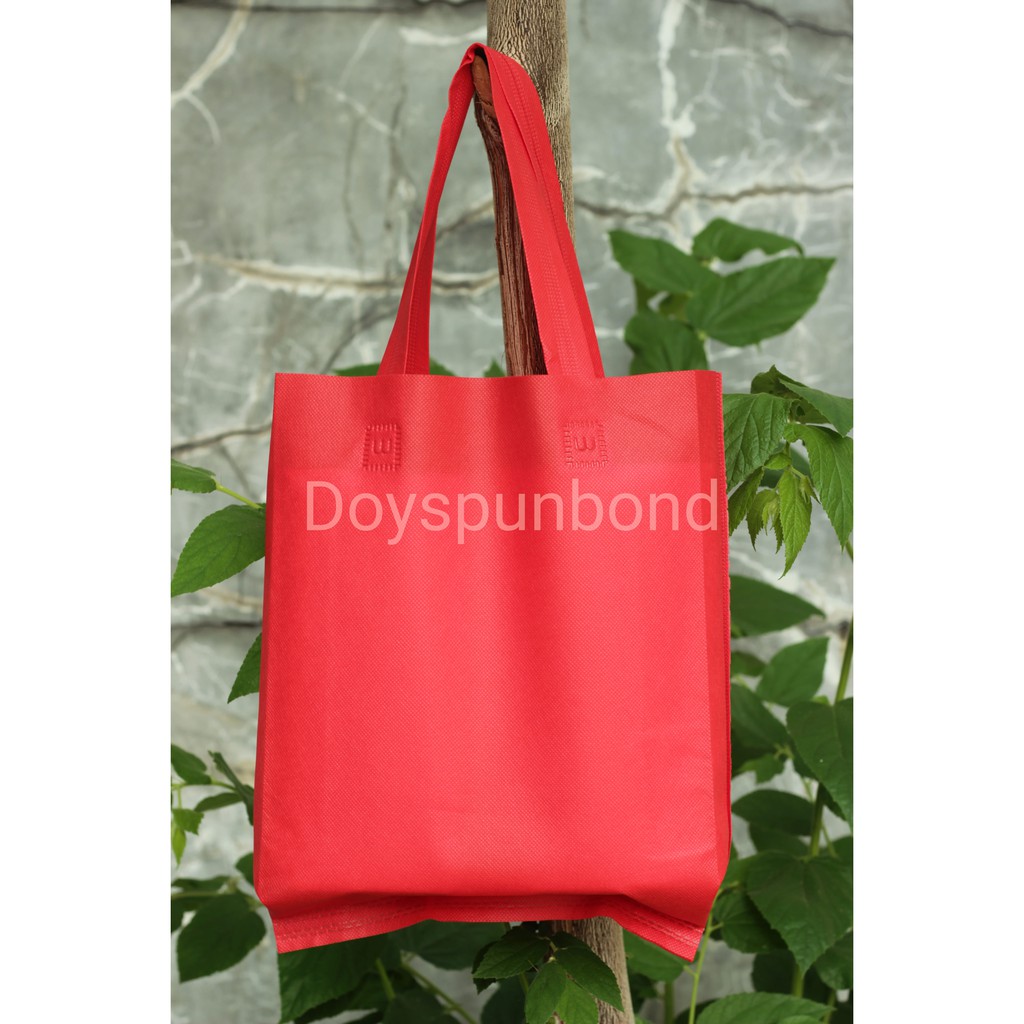 

Tas Spunbond Handle Lipat Samping 25x35x8 | Goodie Bag | Tas Spunbond Polos