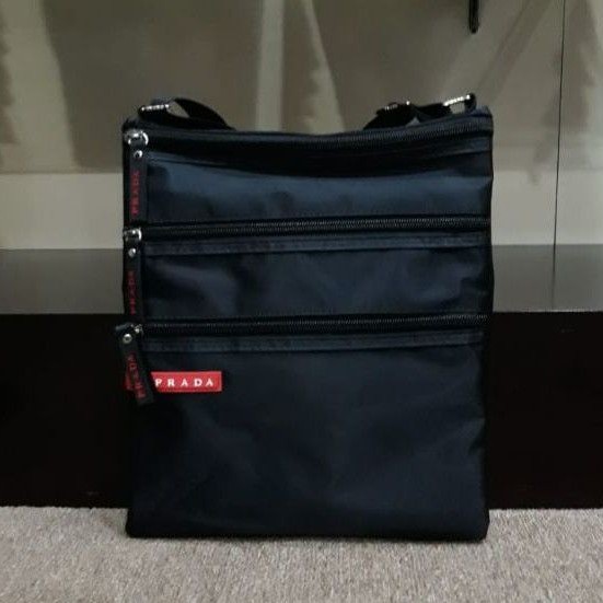 tas slempang pria model tipis kecil banyak resleting nylon waterproff