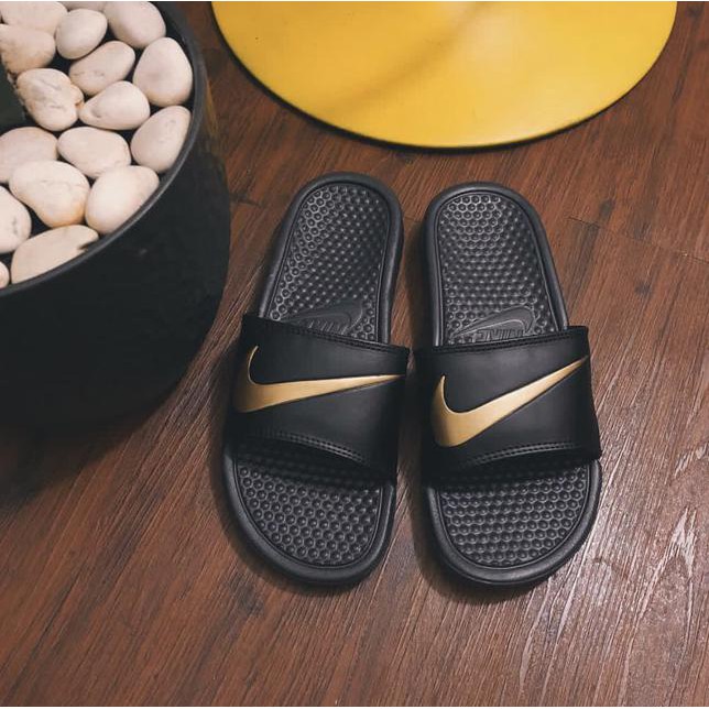 nike black gold slides