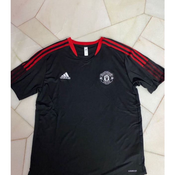 JERSEY MU TRAINING PREMATCH PRE MATCH BLACK NEW MUSIM 21 22 2021 2022 GO GRADE ORIGINAL