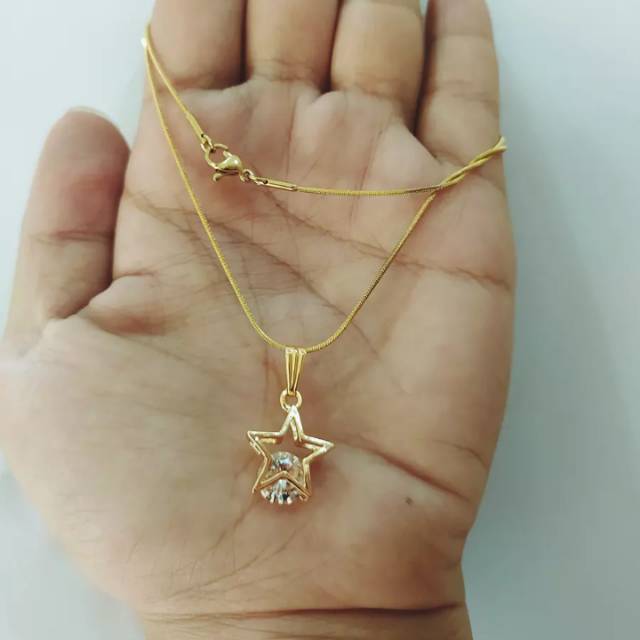 Kalung liontin bintang cantik titanium gold 18k