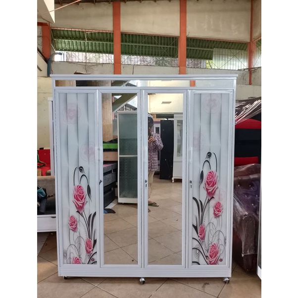 lemari alumunium 4 pintu putih motif bungan