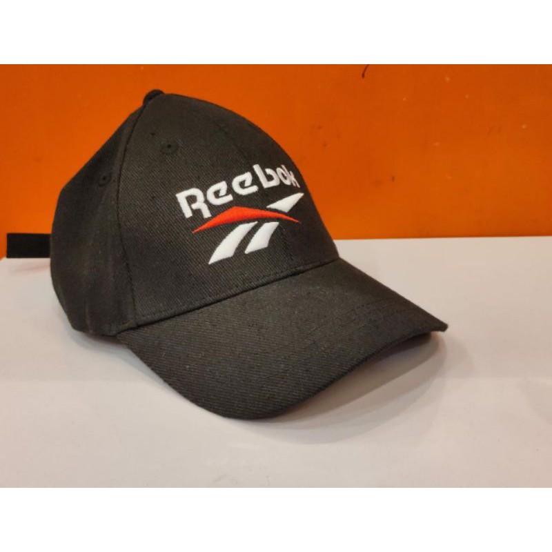 topi reebok hitam original
