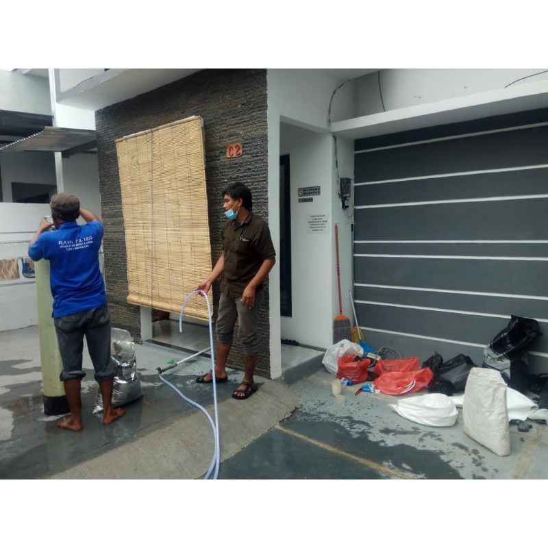 Filter Air Ganti media filter air tabung 1054