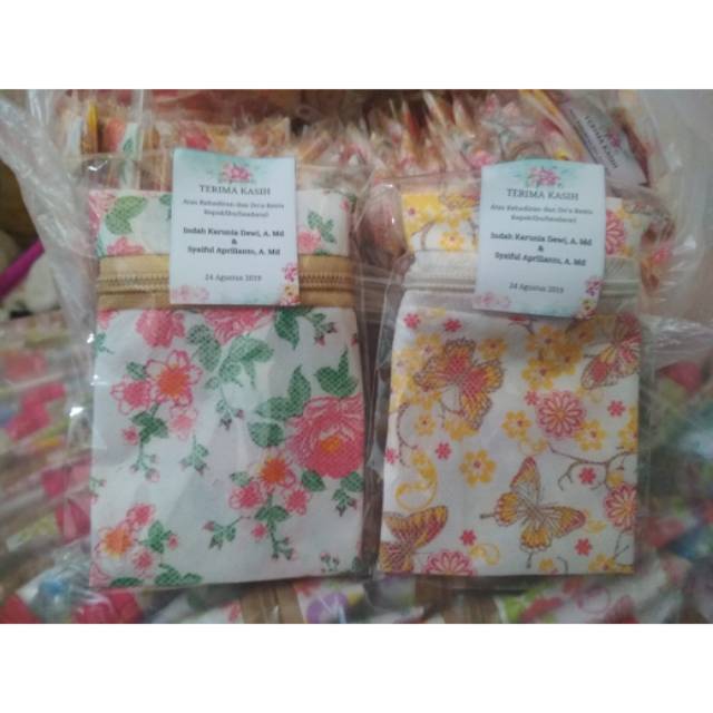 souvenir dompet spunbond motif kemas
