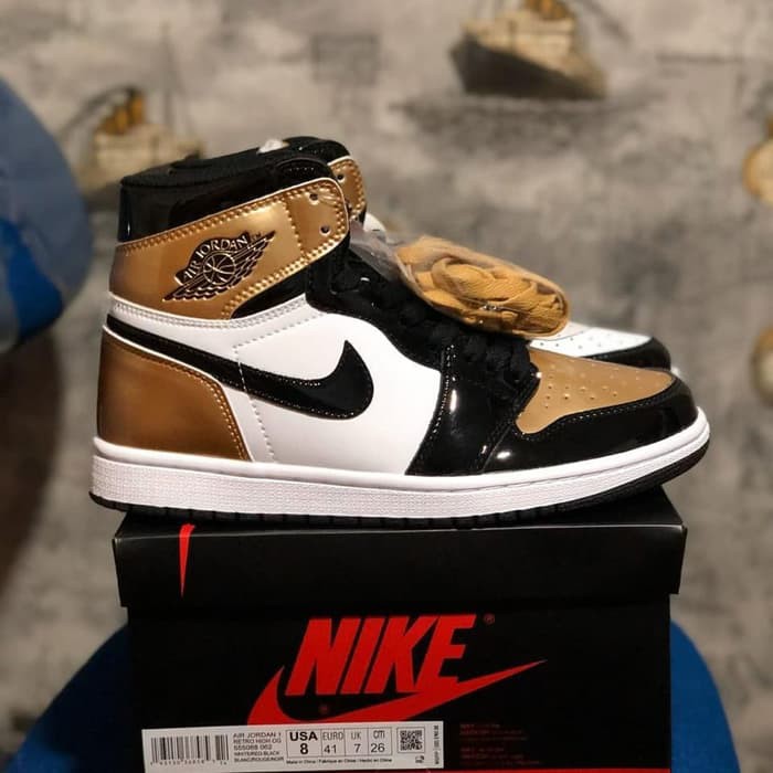 nike gold jordan 1