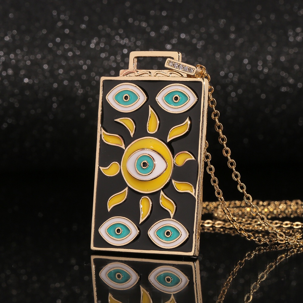 Eropa dan Amerika perhiasan persegi panjang drop minyak liontin Sun Devil Mata kalung