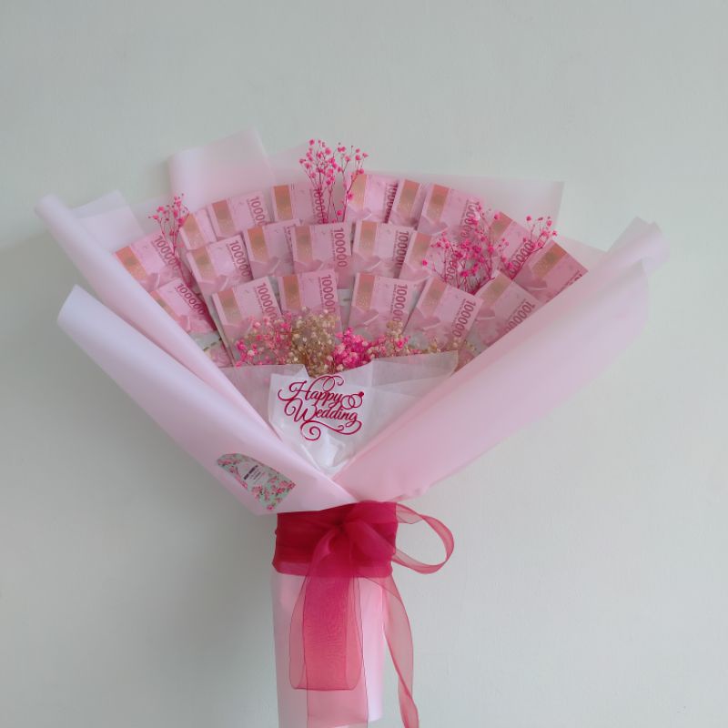 

ANGPAO WEDDING KEKINIAN (BUKET UANG PECAHAN 100 RIBUAN)