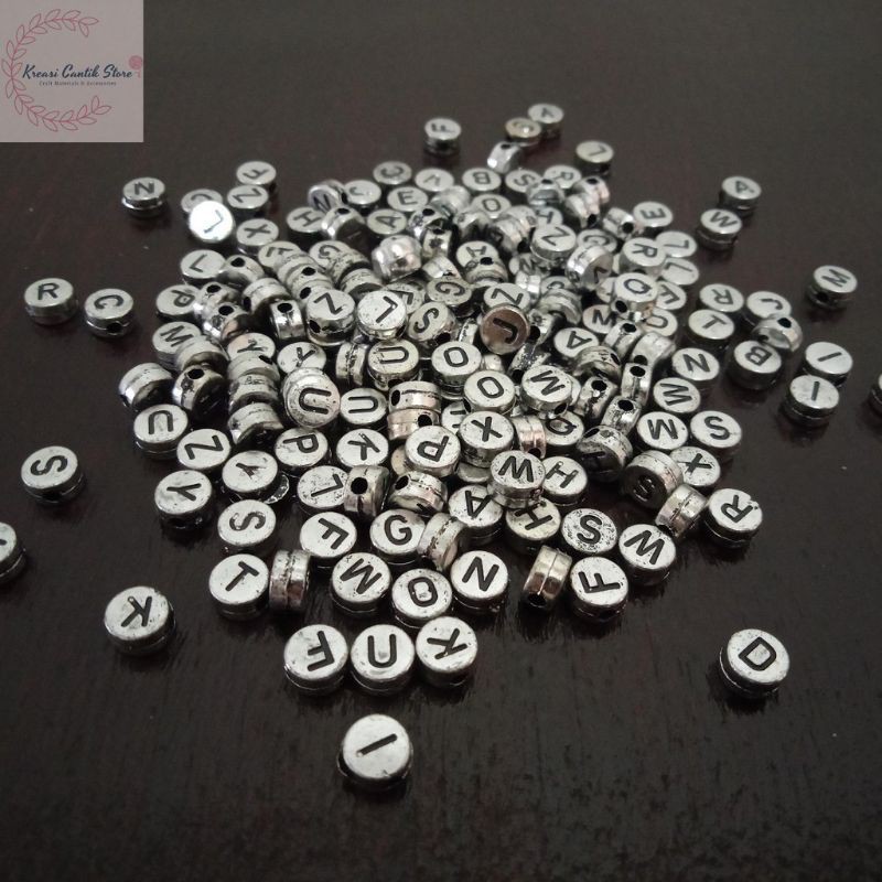 (15 gram) Mote huruf bulat silver dan emas