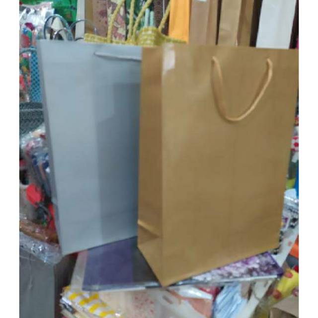 

Paper bag polio gold & silver bahan tebal isi 12pcs bahan dupex tebal gold & silver