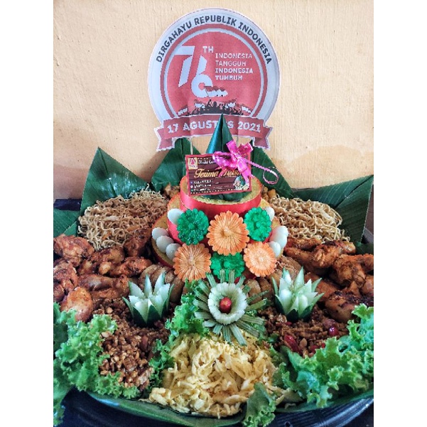 

Tumpeng Nasi kuning special kemerderkaan