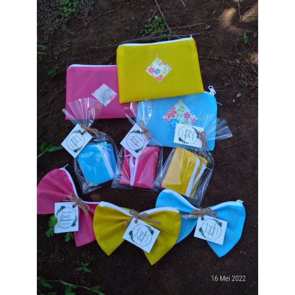 sovenir pernikahan/dompet sovenir/sovenir spundbond/wedding sovenir/sovenir murah/pouch sovenir