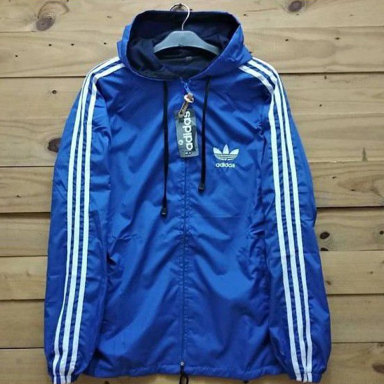Jaket parasut adidas biru list putih