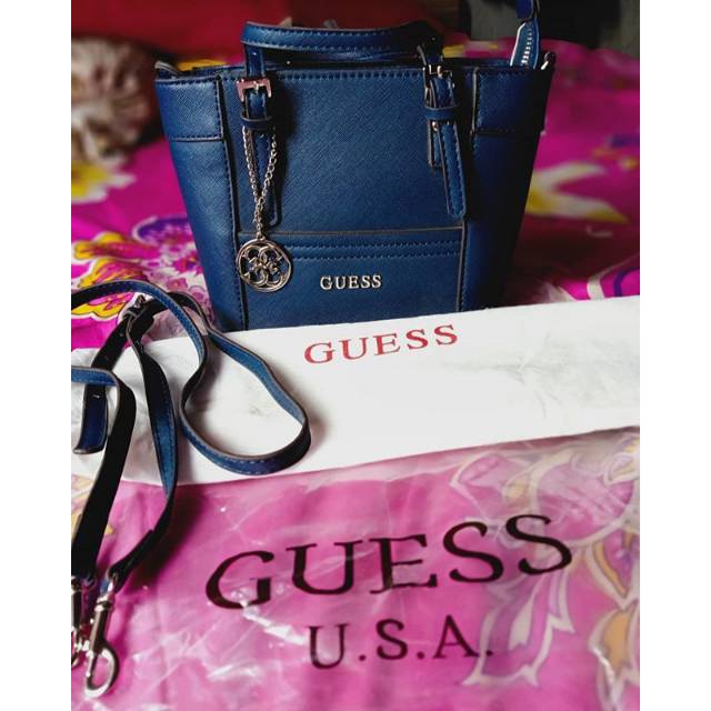 Tas guess preloved guess delaney mini preloved second pl