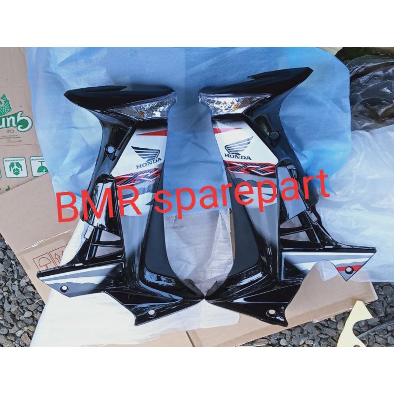 sayap samping Honda Supra x 125 tahun 2009-2011