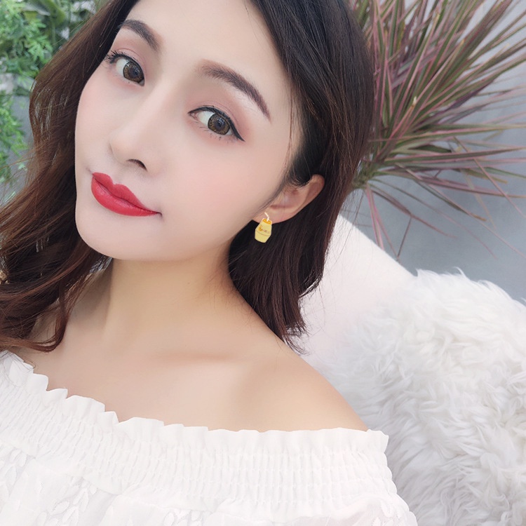 Anak Korea gaya lucu pisang susu asimetris menggemaskan gadis anting-anting cute gas anting-anting K