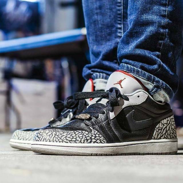 jordan 1 low black cement