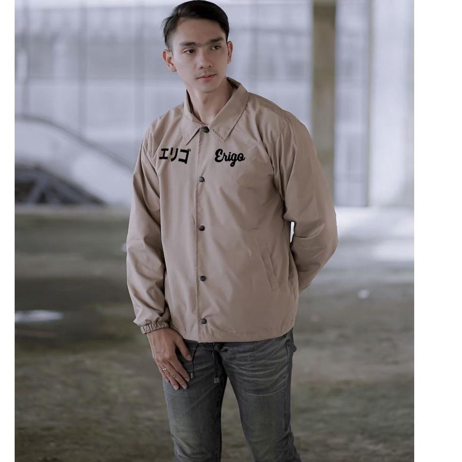 codeYy5Y9--Jaket coach pria erigo original 100% terbaru warna cream / hitam / army japan full print 