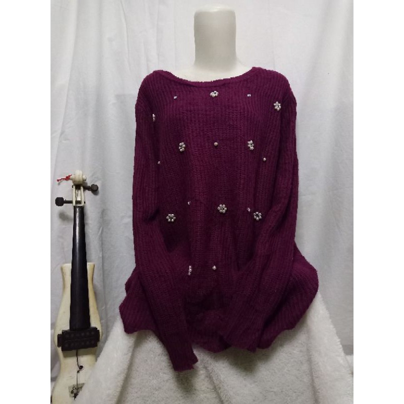 Sweater magenta variasi mutiara