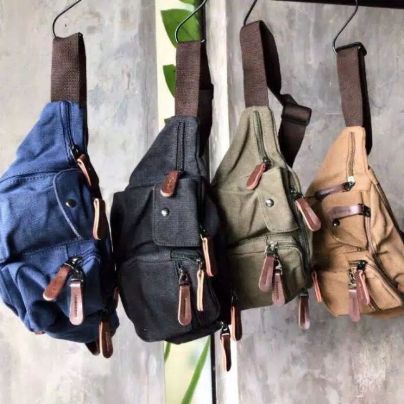 Tas pinggang kanvas mugu 8688 (tas import, tas santai, tas waistbag, tas buat hp/tab,tas buat uang)