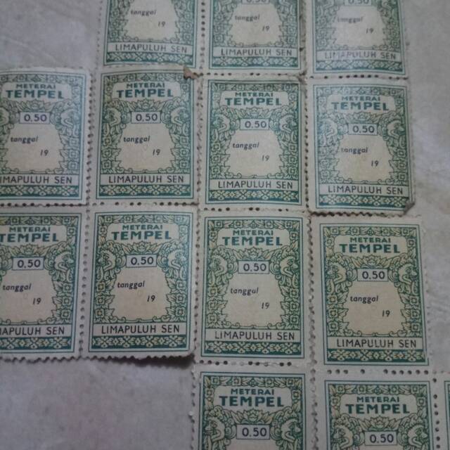 

MATERAI TEMPEL 50 SEN TAHUN 1960-1970