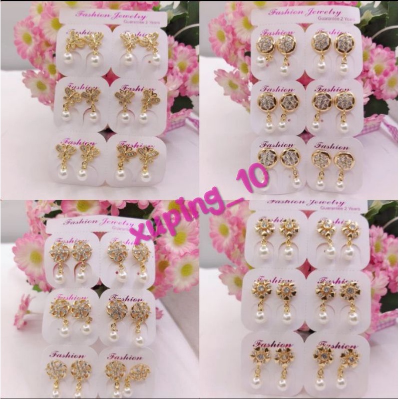Grosir 1 Lusin anting jepit mutiara dewasa xp gold, model random. ATG01.