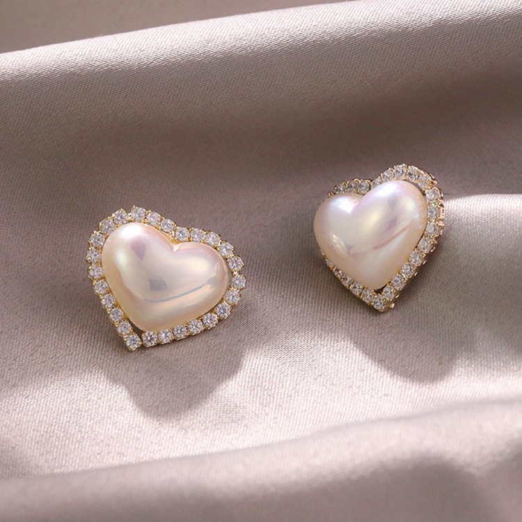 Jantung pearl stud anting-anting wanita elegan Korea Internet baru trendi halus dan sederhana berlia