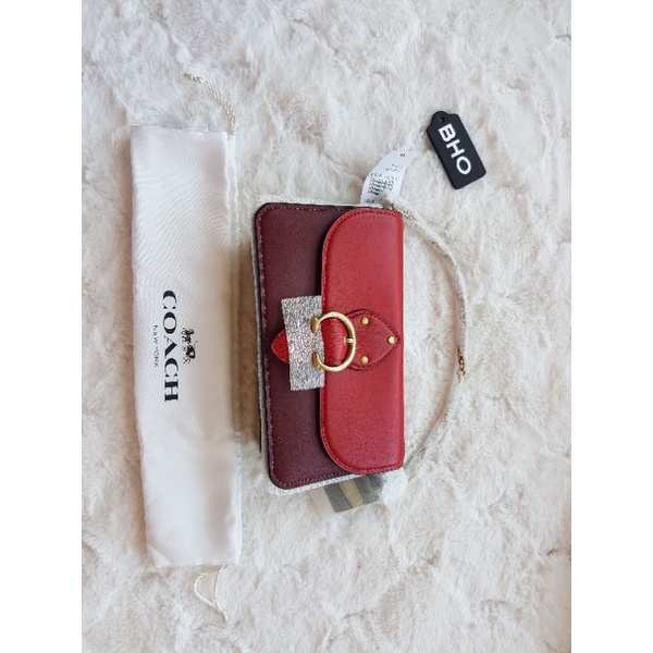 Coach beat clutch lunar series