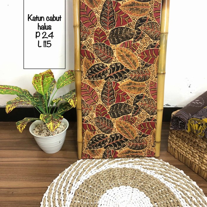 kain batik cabut motif daun daun