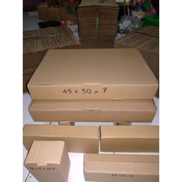 

Kardus laptop baru 45x30x7 tebal satu set dengan dus pengaman
