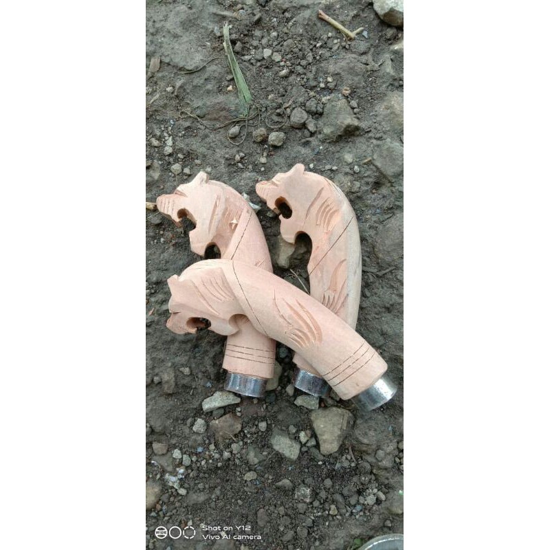 gagang golok macan ukir