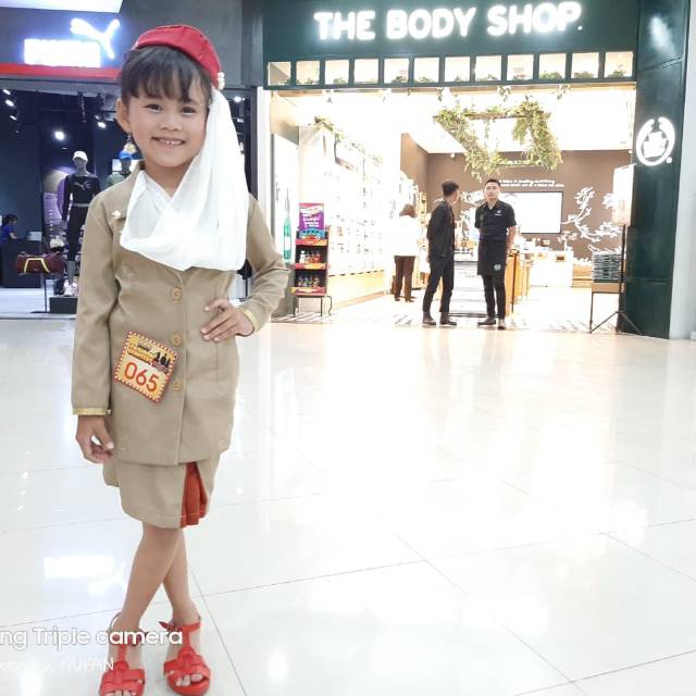 Baju profesi pramugari qatar