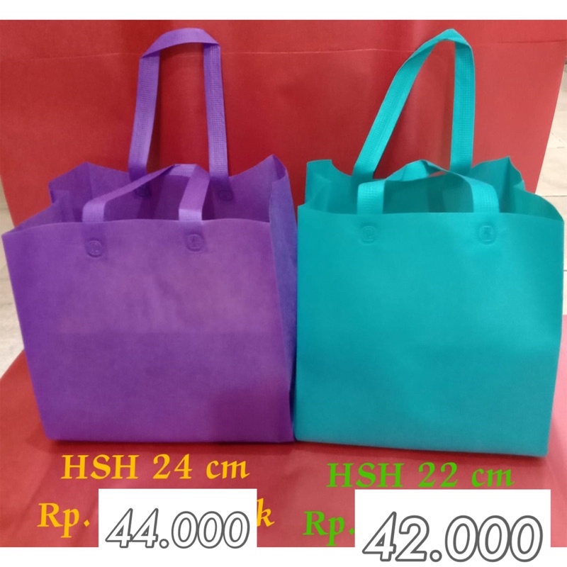 

isi 12 SPUNBOND KUE BOLU CHIFON PARCEL GOODIEBAG KUE