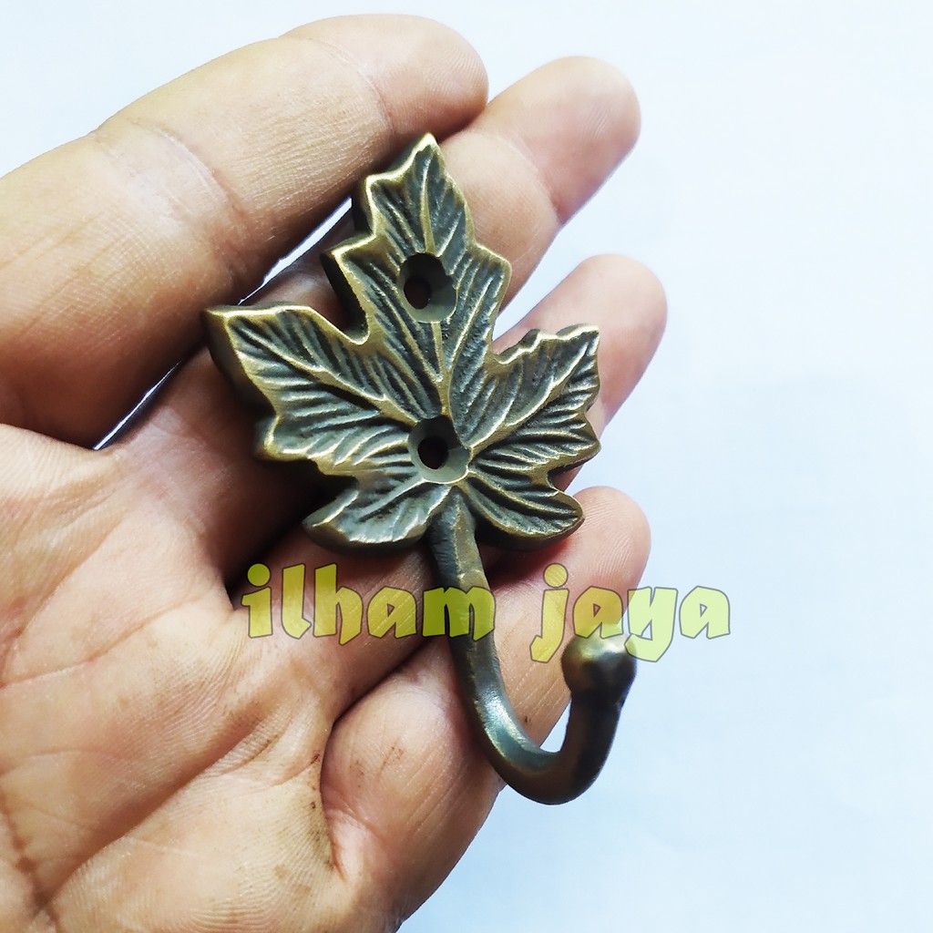 kapstok gantungan baju unik motif daun kuningan antik kuno