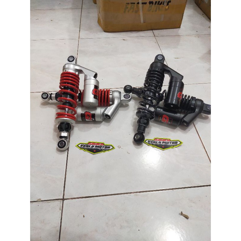 SHOCK DKT GP MERAH & BLACK 320