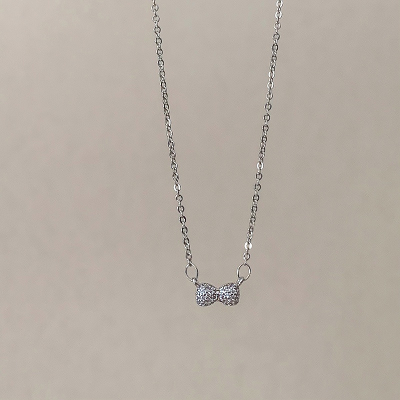 Kalung Liontin Pita Hias Kristal Berlian Imitasi Warna Silver Gaya Korea Untuk Wanita